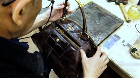 old riped up prada bag|Prada bag restoration.